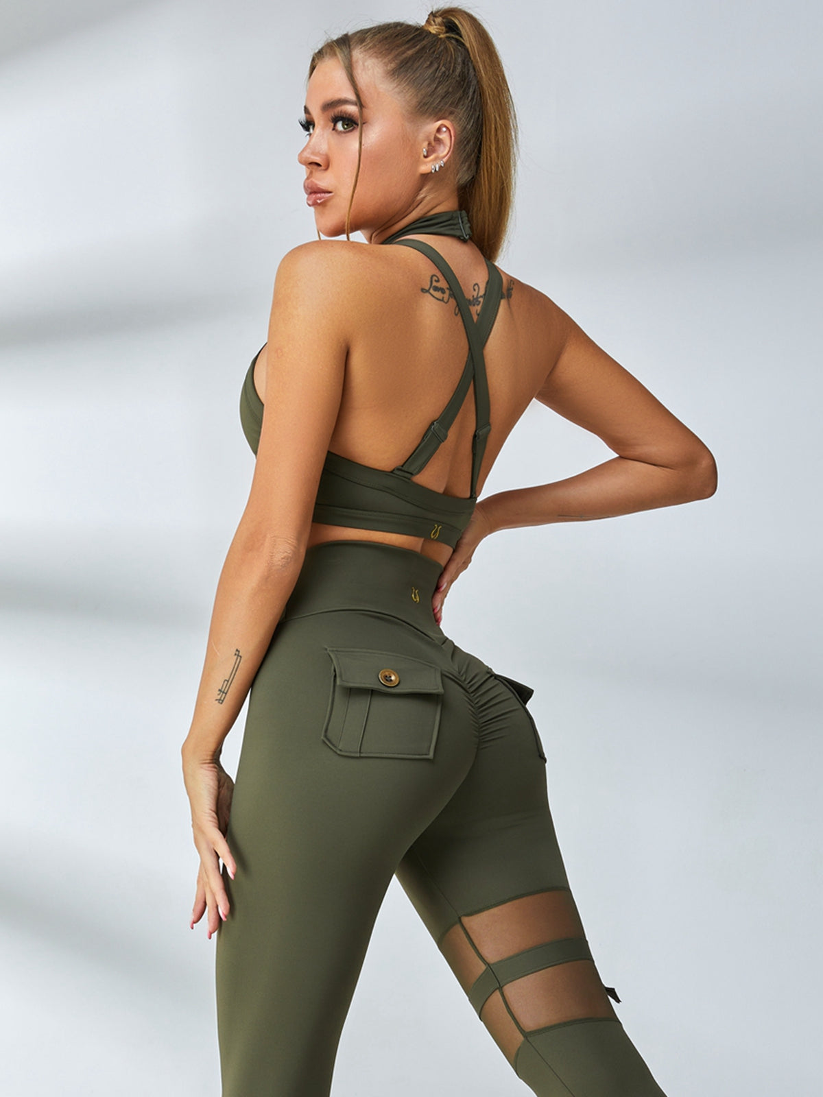 LiviaGym Female Unique Cut Out Pocket Mesh Scrunch Bum Sportswear