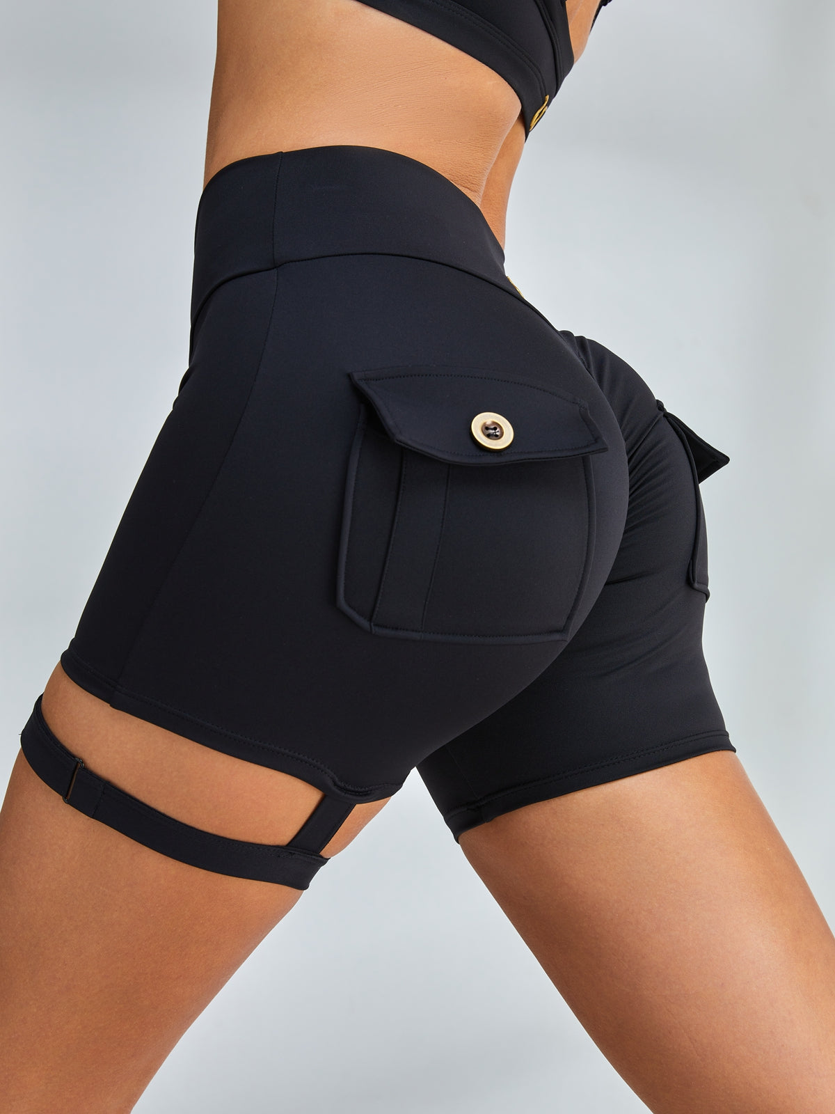 LiviaGym Female Unique Cut Out Pocket Mesh Scrunch Bum Spandex Gym Booty Shorts