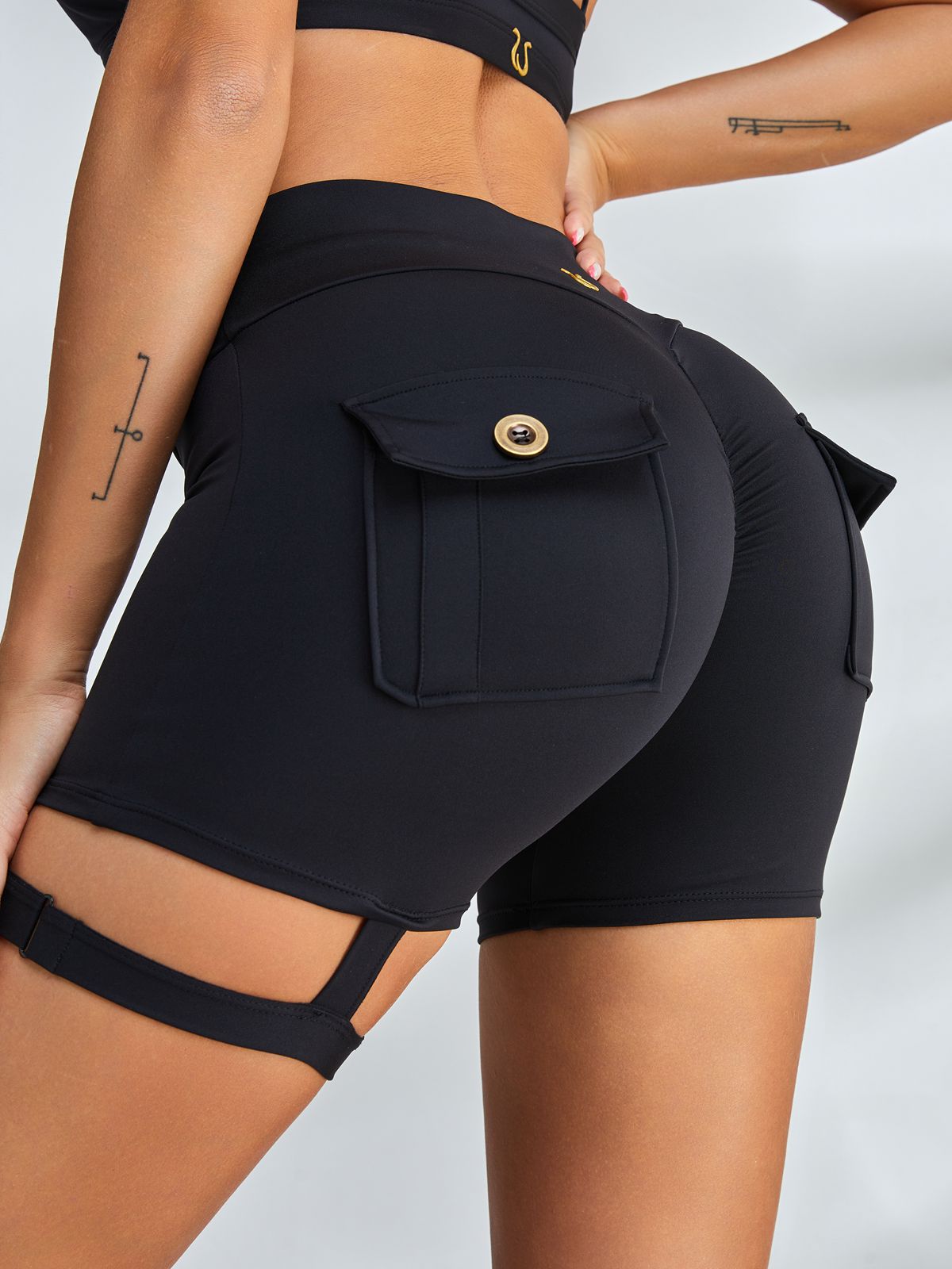 LiviaGym Female Unique Cut Out Pocket Mesh Scrunch Bum Spandex Gym Booty Shorts